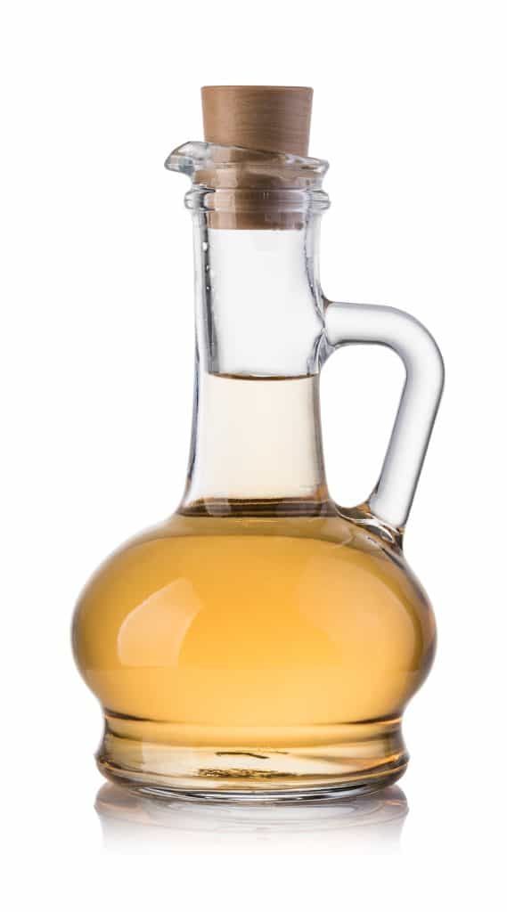 White wine vinegar in fancy glass decanter